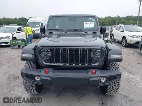 2025 Jeep Wrangler Rubicon with VIN 1C4PJXFN7SW521501, listed as a IAAI auction lot 42906778 with 7,819 mi miles and . Bid and sale history available at DreamBid. Image 12.