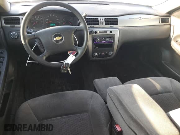 2010 Chevrolet Impala Police Police with VIN 2G1WD5EM1A1259652, listed as a Copart auction lot 42227965 with 128,396 mi miles and Salvage title. Bid and sale history available at DreamBid. Image 8.