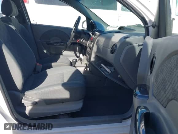 2005 Chevrolet Aveo LS with VIN KL1TD62605B449266, listed as a IAAI auction lot 43553305 with 157,085 mi miles and . Bid and sale history available at DreamBid. Image 5.