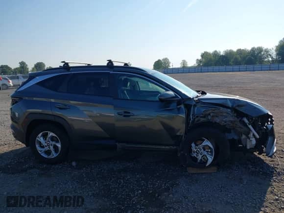 2022 Hyundai Tucson SEL with VIN 5NMJB3AE5NH150901, listed as a IAAI auction lot 43232299 with 72,731 mi miles and . Bid and sale history available at DreamBid. Image 13.