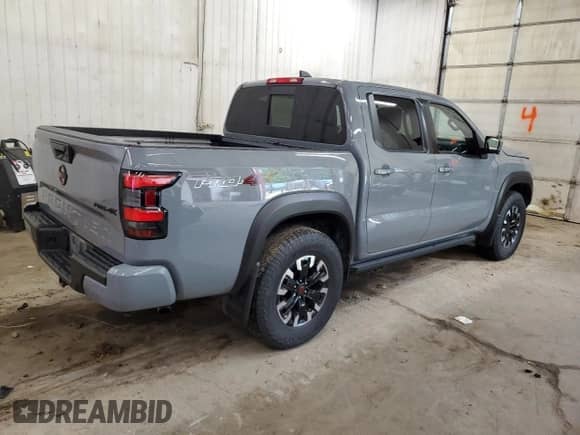 2023 Nissan Frontier SV with VIN 1N6ED1EKXPN665251, listed as a Copart auction lot 64623895 with 23,384 mi miles and Salvage title. Bid and sale history available at DreamBid. Image 3.