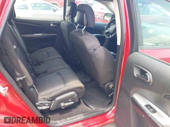 2014 Dodge Journey SE z VIN 3C4PDCABXET258671, wystawiony jako IAAI lot #42714929 z przebiegiem 247 599 mil mil oraz . Historia ofert i sprzedaży dostępna na DreamBid. Obrazek 8.