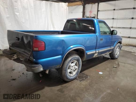 2000 Chevrolet S-10 LS с VIN 1GCDT14W6YK185636, выставлен на аукционе Copart как лот 76531174 с пробегом 187 747 миль миль и Списание • Salvage title. История ставок и продаж доступна на DreamBid. Изображение 3.