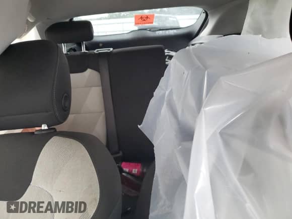 2024 Chevrolet Trax LS z VIN KL77LFE28RC006981, wystawiony jako Copart lot #63583455 z przebiegiem Nie podano mil oraz Szkoda całkowita • Salvage title. Historia ofert i sprzedaży dostępna na DreamBid. Obrazek 10.