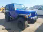 2000 Jeep Wrangler Sport with VIN 1J4FA49S0YP735660, listed as a IAAI auction lot 43192698 with Not provided miles and . Bid and sale history available at DreamBid. Image 1.
