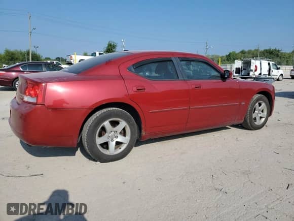 2010 Dodge Charger SXT z VIN 2B3CA3CVXAH107896, wystawiony jako Copart lot #68970235 z przebiegiem 197 785 mil mil oraz Szkoda całkowita • Salvage title. Historia ofert i sprzedaży dostępna na DreamBid. Obrazek 3.