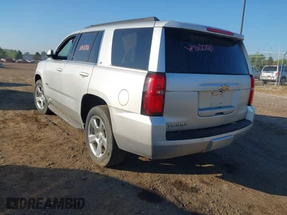 2016 Chevrolet Tahoe LT with VIN 1GNSCBKC4GR468815, listed as a IAAI auction lot 43223810 with 136,753 mi miles and . Bid and sale history available at DreamBid. Image 3.