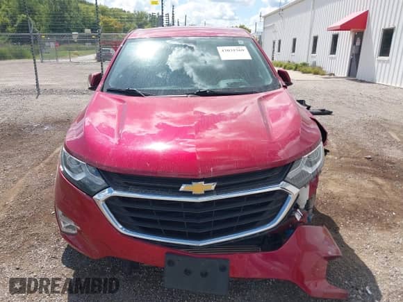 2020 Chevrolet Equinox LT with VIN 3GNAXKEV0LS573663, listed as a IAAI auction lot 43031569 with 63,690 mi miles and . Bid and sale history available at DreamBid. Image 12.