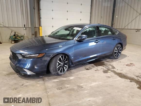 2025 Honda Accord Touring with VIN 1HGCY2F80SA013392, listed as a Copart auction lot 69694195 with 7,271 mi miles and Salvage title. Bid and sale history available at DreamBid. Image 1.