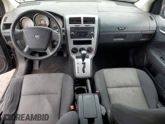 2009 Dodge Caliber SXT z VIN 1B3HB48A59D104346, wystawiony jako Copart lot #81551775 z przebiegiem 211 208 mil mil oraz Szkoda całkowita • Salvage title. Historia ofert i sprzedaży dostępna na DreamBid. Obrazek 8.