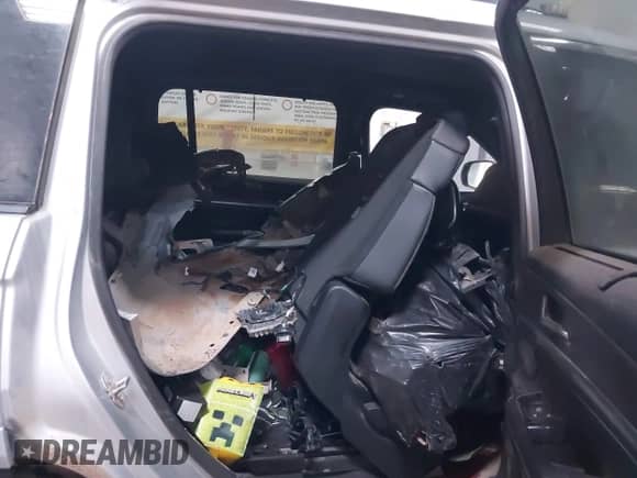 2021 Jeep Grand Cherokee Overland with VIN 1C4RJKDG3M8119823, listed as a IAAI auction lot 42163425 with 54,560 mi miles and . Bid and sale history available at DreamBid. Image 8.