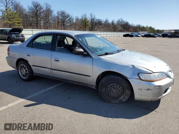 2000 Honda Accord LX с VIN 1HGCG6558YA106929, выставлен на аукционе Copart как лот 50229935 с пробегом 244 574 миль миль и Списание • Salvage title. История ставок и продаж доступна на DreamBid. Изображение 4.