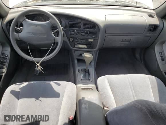 1995 Toyota Camry LE с VIN 4T1GK12E2SU087124, выставлен на аукционе Copart как лот 61196345 с пробегом 98 578 миль миль и Чистый • Clean title. История ставок и продаж доступна на DreamBid. Изображение 8.