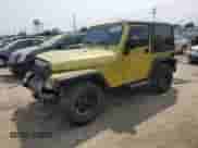 2003 Jeep Wrangler Sahara с VIN 1J4FA59S03P313418, выставлен на аукционе Copart как лот 64883094 с пробегом 184 658 миль миль и Списание • Salvage title. История ставок и продаж доступна на DreamBid. Изображение 1.