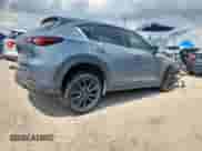 2024 Mazda CX-5 S Preferred z VIN JM3KFBCL5R0412704, wystawiony jako Copart lot #70064615 z przebiegiem Nie podano mil oraz Szkoda całkowita • Salvage title. Historia ofert i sprzedaży dostępna na DreamBid. Obrazek 3.