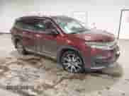 2021 Honda Pilot Touring 7-Passenger z VIN 5FNYF6H61MB044707, wystawiony jako IAAI lot #41548250 z przebiegiem 77 147 mil mil oraz . Historia ofert i sprzedaży dostępna na DreamBid. Obrazek 1.