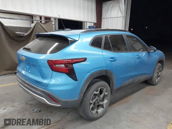 2025 Chevrolet Trax LT with VIN KL77LHEP2SC051542, listed as a IAAI auction lot 42881478 with 19,817 mi miles and . Bid and sale history available at DreamBid. Image 4.
