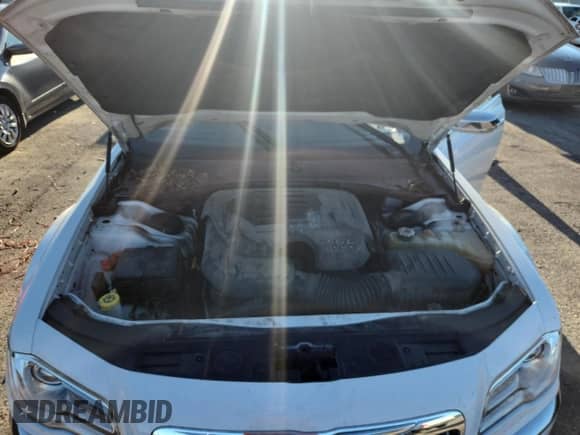 2013 Chrysler 300 C с VIN 2C3CCAKG0DH556738, выставлен на аукционе Copart как лот 69880855 с пробегом 151 194 миль миль и На запчасти • Non repairable. История ставок и продаж доступна на DreamBid. Изображение 11.