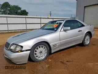 1997 Mercedes-Benz SL 500 с VIN WDBFA63F2VF144081, выставлен на аукционе Copart как лот 59100225 с пробегом 109 238 миль миль и Списание • Salvage title. История ставок и продаж доступна на DreamBid. Изображение 1.