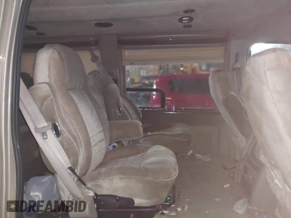 2002 Ford Econoline Cargo Recreational with VIN 1FDRE14L22HB53224, listed as a IAAI auction lot 41967017 with 202,065 mi miles and . Bid and sale history available at DreamBid. Image 8.