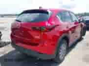2023 Mazda CX-5 S Carbon Edition z VIN JM3KFBCM5P0134148, wystawiony jako IAAI lot #42455010 z przebiegiem 57 414 mil mil oraz . Historia ofert i sprzedaży dostępna na DreamBid. Obrazek 4.
