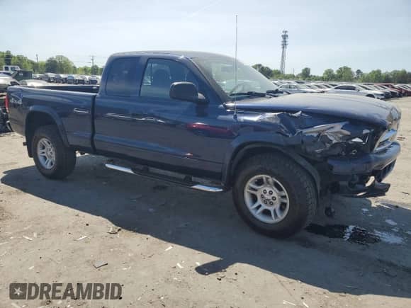 2004 Dodge Dakota Sport with VIN 1D7HG32N54S709869, listed as a Copart auction lot 54254235 with 64,967 mi miles and Salvage title. Bid and sale history available at DreamBid. Image 4.