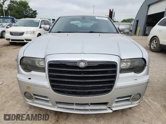 2007 Chrysler 300 C SRT-8 with VIN 2C3LA73W17H617839, listed as a Copart auction lot 60858475 with 180,655 mi miles and Salvage title. Bid and sale history available at DreamBid. Image 5.