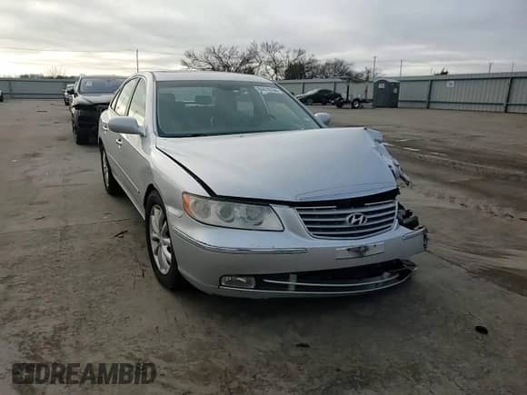 2007 Hyundai Azera SE с VIN KMHFC46F87A211239, выставлен на аукционе Copart как лот 84478194 с пробегом Не указан миль и Списание • Salvage title. История ставок и продаж доступна на DreamBid. Изображение 11.