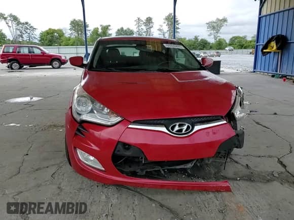 2013 Hyundai Veloster w/Black Int z VIN KMHTC6AD1DU108579, wystawiony jako Copart lot #69996895 z przebiegiem 187 355 mil mil oraz Szkoda całkowita • Salvage title. Historia ofert i sprzedaży dostępna na DreamBid. Obrazek 13.