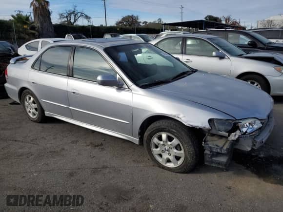 2002 Honda Accord EX with VIN JHMCG660X2C030142, listed as a Copart auction lot 86366424 with 215,783 mi miles and Salvage title. Bid and sale history available at DreamBid. Image 4.