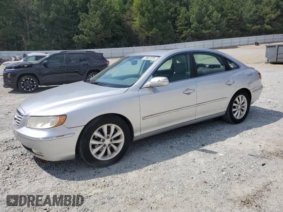 2008 Hyundai Azera Limited z VIN KMHFC46F08A319260, wystawiony jako Copart lot #70887225 z przebiegiem 76 313 mil mil oraz Szkoda całkowita • Salvage title. Historia ofert i sprzedaży dostępna na DreamBid. Obrazek 1.