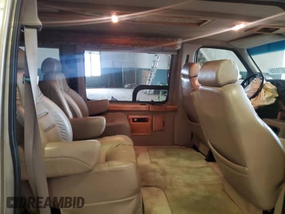 2002 Ford Econoline Cargo Recreational with VIN 1FDRE14W32HB64467, listed as a Copart auction lot 81878595 with 139,517 mi miles and Salvage title. Bid and sale history available at DreamBid. Image 11.