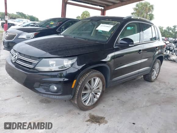 2015 Volkswagen Tiguan S with VIN WVGAV7AX5FW591728, listed as a IAAI auction lot 43205069 with 81,126 mi miles and . Bid and sale history available at DreamBid. Image 18.