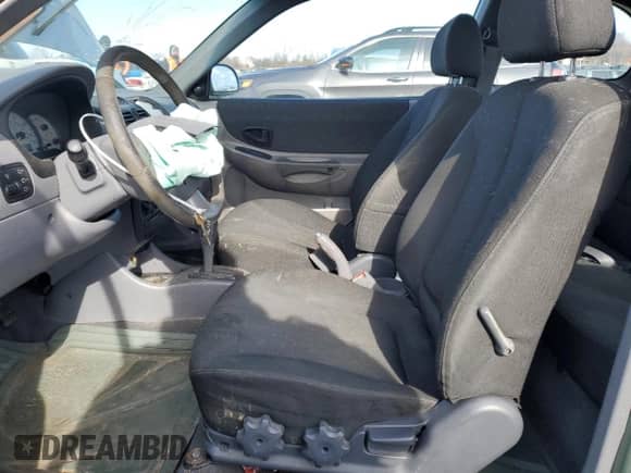 2003 Hyundai Accent GL z VIN KMHCG35CX3U242820, wystawiony jako Copart lot #45971325 z przebiegiem 132 192 mil mil oraz Szkoda całkowita • Salvage title. Historia ofert i sprzedaży dostępna na DreamBid. Obrazek 7.