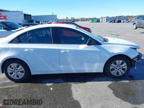 2015 Chevrolet Cruze LS with VIN 1G1PB5SH2F7291005, listed as a IAAI auction lot 41262811 with 112,153 mi miles and . Bid and sale history available at DreamBid. Image 12.