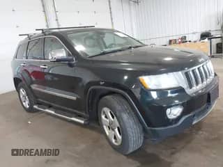 2012 Jeep Grand Cherokee Overland z VIN 1C4RJFCG1CC231850, wystawiony jako IAAI lot #42199366 z przebiegiem 210 608 mil mil oraz . Historia ofert i sprzedaży dostępna na DreamBid. Obrazek 1.