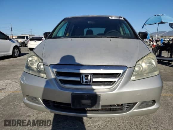 2007 Honda Odyssey LX с VIN 5FNRL38267B048104, выставлен на аукционе Copart как лот 87488925 с пробегом 117 119 миль миль и Списание • Salvage title. История ставок и продаж доступна на DreamBid. Изображение 5.