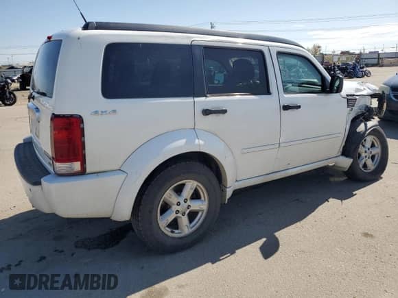 2011 Dodge Nitro SXT z VIN 1D4PU5GK5BW535223, wystawiony jako Copart lot #54922795 z przebiegiem 201 650 mil mil oraz Szkoda całkowita • Salvage title. Historia ofert i sprzedaży dostępna na DreamBid. Obrazek 3.