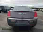 2016 Chrysler 300 Anniversary Edition с VIN 2C3CCAAG7GH244020, выставлен на аукционе Copart как лот 84069525 с пробегом 164 708 миль миль и Списание • Salvage title. История ставок и продаж доступна на DreamBid. Изображение 6.