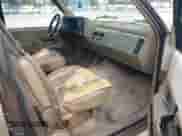 1994 Chevrolet Suburban with VIN 1GNEC16K7RJ436015, listed as a IAAI auction lot 41739287 with 285,425 mi miles and . Bid and sale history available at DreamBid. Image 5.