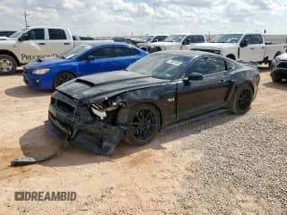 2015 Ford Mustang GT z VIN 1FA6P8CF7F5386082, wystawiony jako Copart lot #70818645 z przebiegiem 77 842 mil mil oraz Szkoda całkowita • Salvage title. Historia ofert i sprzedaży dostępna na DreamBid. Obrazek 1.