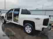 2013 Chevrolet Silverado 1500 LTZ with VIN 3GCPKTE72DG131724, listed as a Copart auction lot 82139705 with 183,083 mi miles and Salvage title. Bid and sale history available at DreamBid. Image 2.
