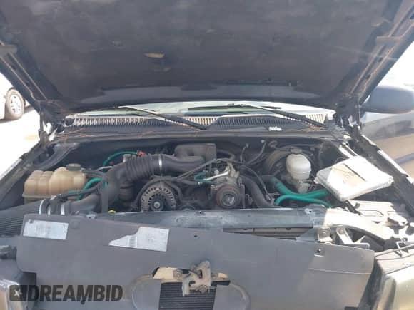 2005 Chevrolet Silverado 1500 Work Truck z VIN 1GCEC19X75Z352059, wystawiony jako IAAI lot #43358817 z przebiegiem Nie podano mil oraz . Historia ofert i sprzedaży dostępna na DreamBid. Obrazek 10.