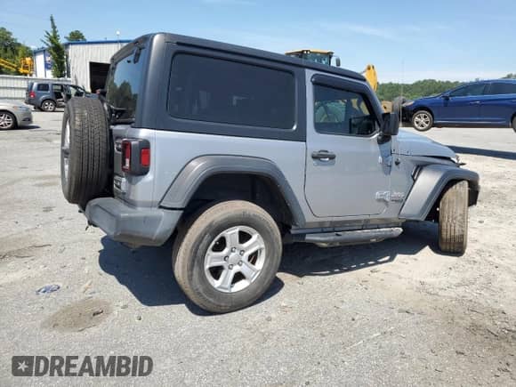 2020 Jeep Wrangler Sport S with VIN 1C4GJXAG8LW215563, listed as a Copart auction lot 70423945 with 69,559 mi miles and Salvage title. Bid and sale history available at DreamBid. Image 3.