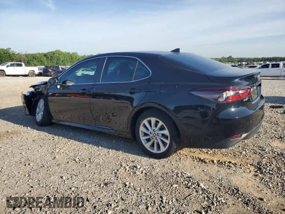 2023 Toyota Camry LE with VIN 4T1R11AK7PU084875, listed as a Copart auction lot 55857395 with 26,473 mi miles and Salvage title. Bid and sale history available at DreamBid. Image 2.
