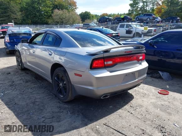2011 Dodge Charger RT Max with VIN 2B3CM5CT0BH521787, listed as a IAAI auction lot 43317430 with 78,221 mi miles and . Bid and sale history available at DreamBid. Image 3.