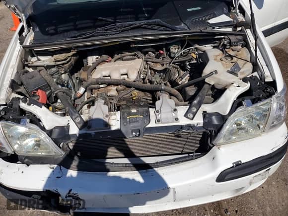 2003 Chevrolet Venture 1SA with VIN 1GNDX03E73D308064, listed as a Copart auction lot 66573505 with 105,888 mi miles and Salvage title. Bid and sale history available at DreamBid. Image 12.