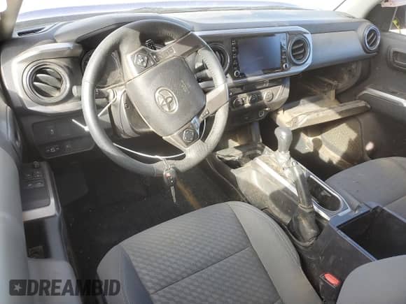2022 Toyota Tacoma SR z VIN 3TYSZ5AN0NT091172, wystawiony jako Copart lot #56365785 z przebiegiem Nie podano mil oraz Szkoda całkowita • Salvage title. Historia ofert i sprzedaży dostępna na DreamBid. Obrazek 8.