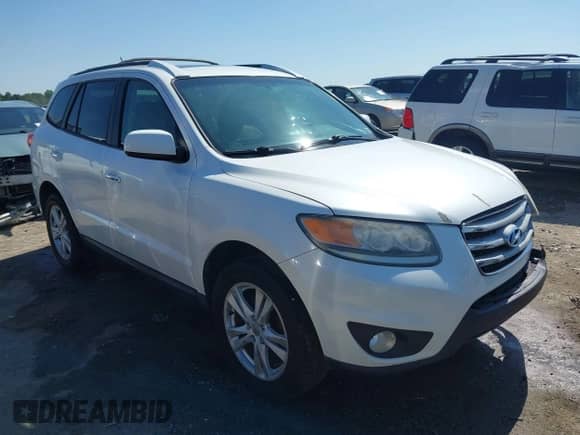 2012 Hyundai Santa Fe Limited with VIN 5XYZK4AG9CG104117, listed as a IAAI auction lot 42540833 with 142,186 mi miles and . Bid and sale history available at DreamBid. Image 1.