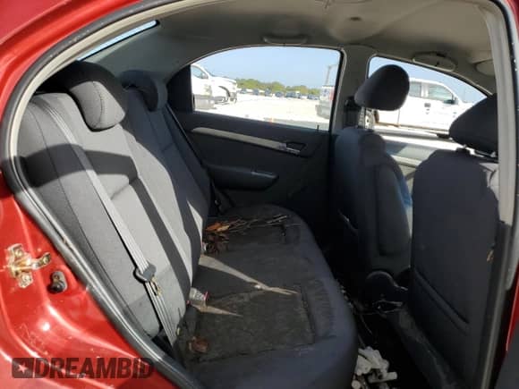 2007 Chevrolet Aveo LS z VIN KL1TD56617B051863, wystawiony jako Copart lot #79996804 z przebiegiem Nie podano mil oraz Szkoda całkowita • Salvage title. Historia ofert i sprzedaży dostępna na DreamBid. Obrazek 10.